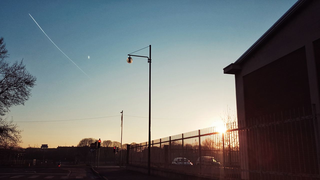 STREET LIGHT AGAINST SKY