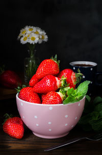 Close-up of strawberries in bowl on table