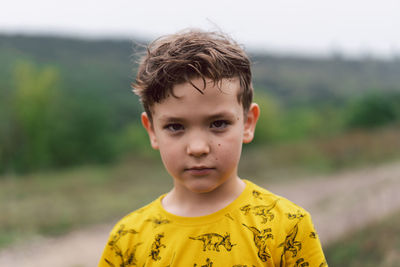 Portrait of a six-year-old boy in the park