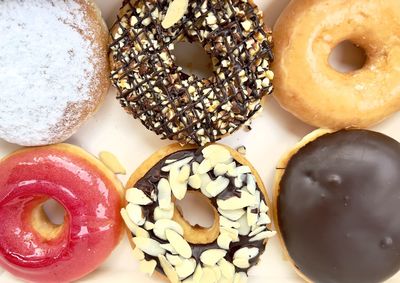 Close-up of donuts on white background