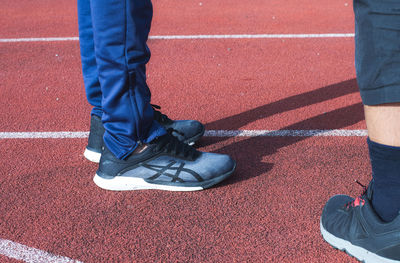 Low section of people standing on floor