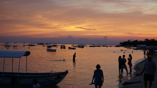 Scenic view of sea at sunset