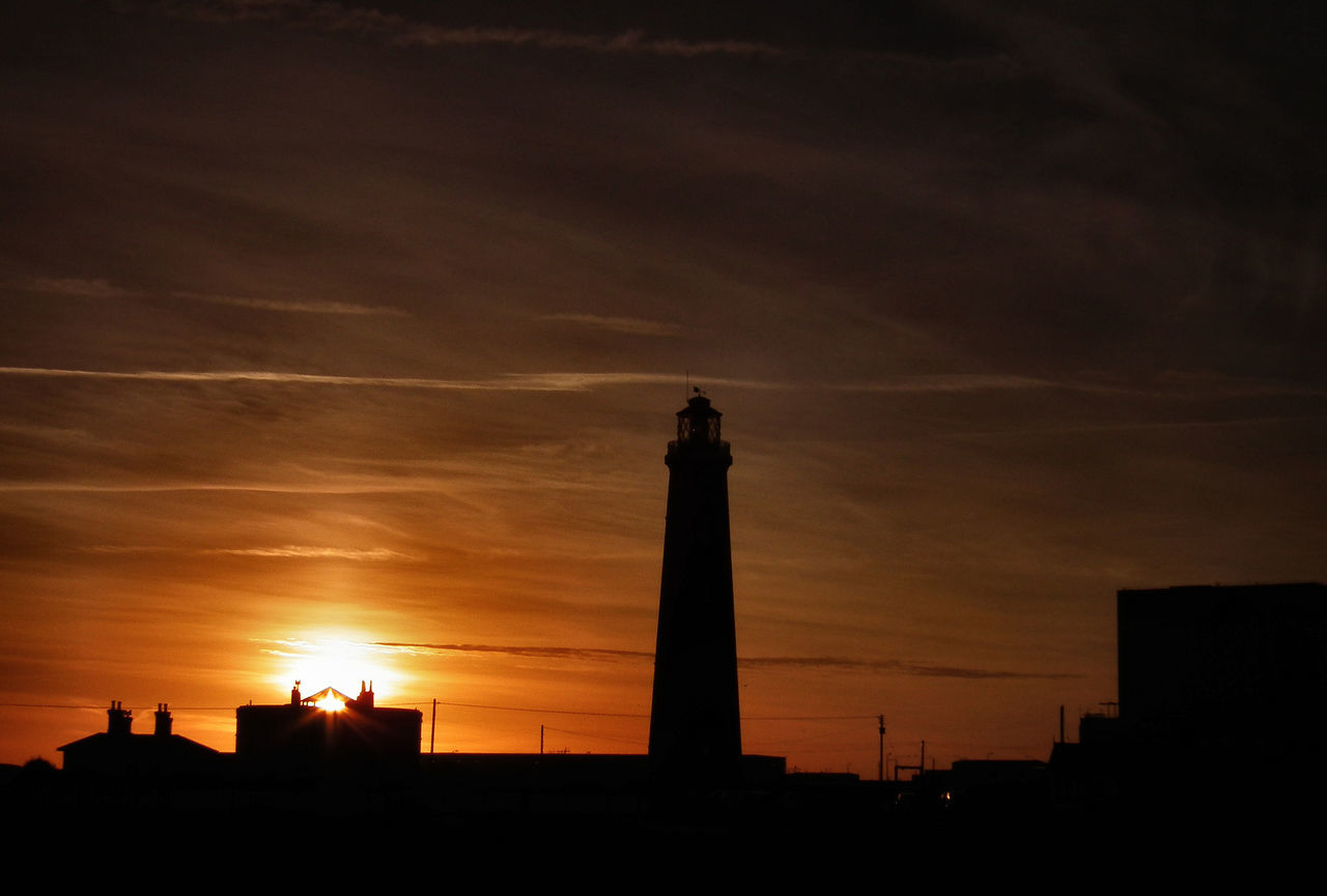 SILHOUETTE OF STATUE OF LIGHTHOUSE