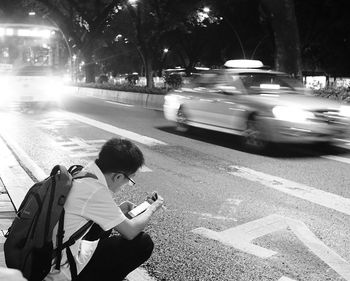 Boy holding umbrella