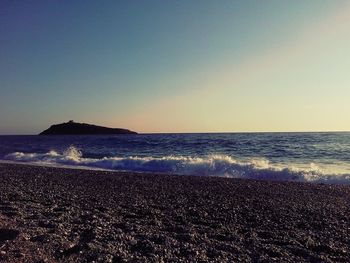 Scenic view of sea at sunset