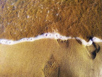 High angle view of sand on beach