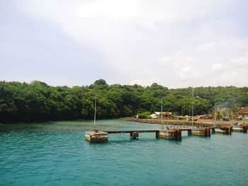 Scenic view of bay against sky