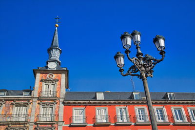 Low angle view of building against blue sky