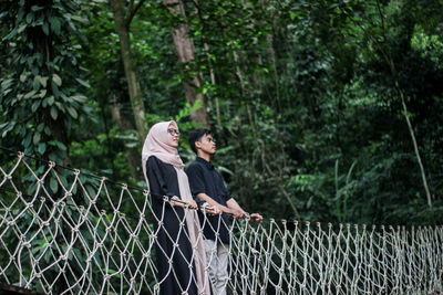 People standing in a forest