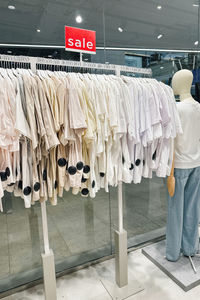 Rear view of woman standing in store