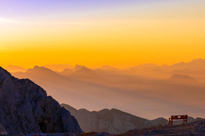 Scenic view of mountains against sky during sunset