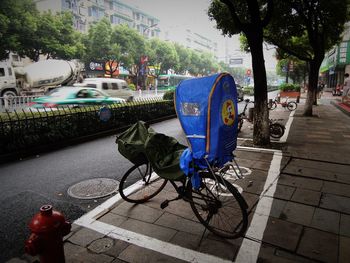 Bicycles parked on street in city