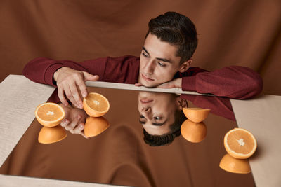 Portrait of man holding ice cream