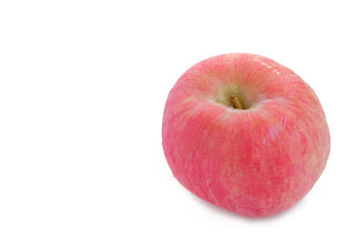 Close-up of apple against white background