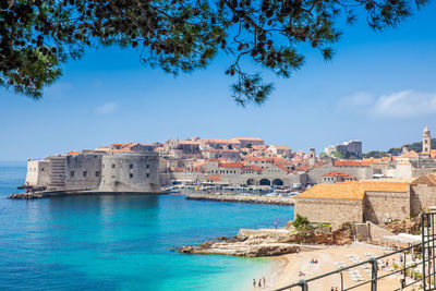 The beautiful banje beach and dubrovnik city