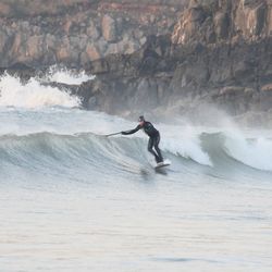 Man surfing in sea