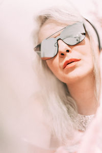 Close-up of woman wearing sunglasses