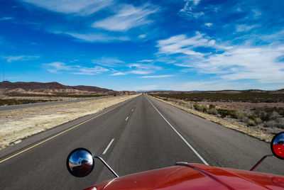 Trucking down the road through a desert mountain highway