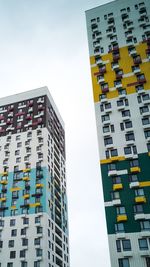 Low angle view of modern buildings against sky