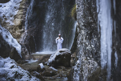 Scenic view of waterfall in forest