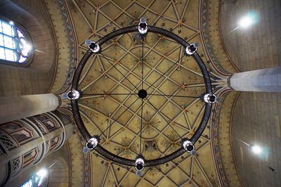 Low angle view of illuminated ceiling