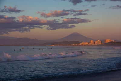 Scenic view of sea against sky during sunset