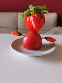 Close-up of fruits in plate on table