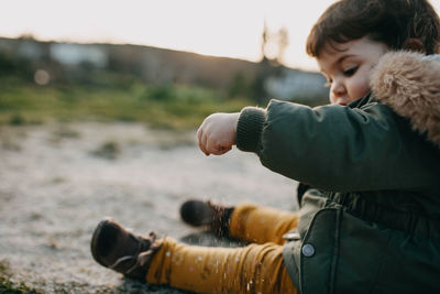 Child playing with sand