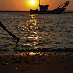 Scenic view of sea at sunset