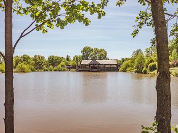 Scenic view of river against sky