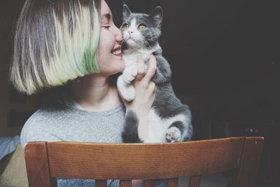 Young woman with cat