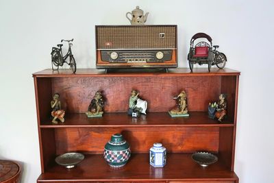 Potted plant on shelf at home