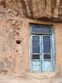 Low angle view of window of old building