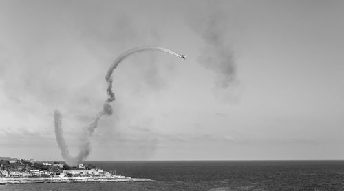 Scenic view of sea against sky airshow