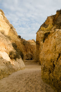 View of rock formation on the beach in portugal. 