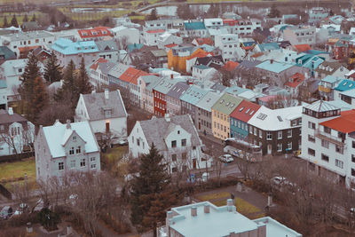 High angle view of townscape and trees during winter