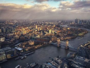 High angle view of river amidst buildings in city