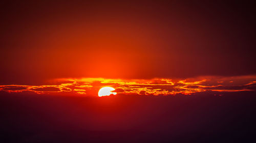 Scenic view of dramatic sky during sunset