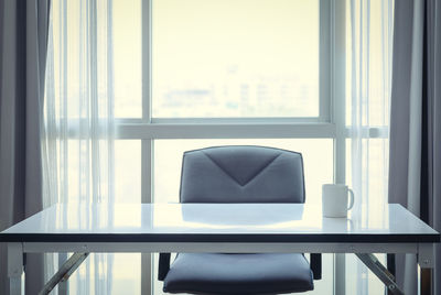 Empty chairs and table at home