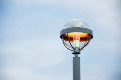 Low angle view of illuminated street light