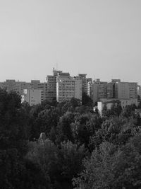 Buildings against clear sky