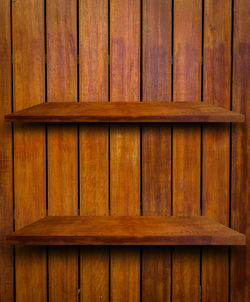 Empty wood shelf,bookshelves on brown wood