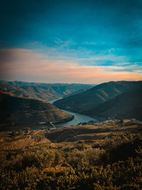 Scenic view of landscape against sky during sunset