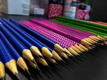 Close-up of colorful pencils on table