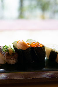 Close-up of sushi in plate on table