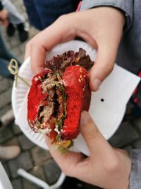 Midsection of person holding ice cream