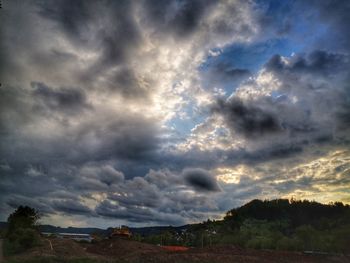 Scenic view of dramatic sky during sunset