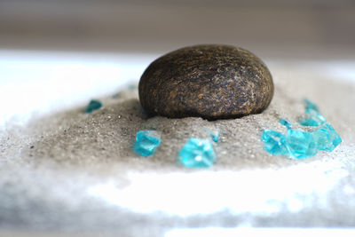 Close-up of stones on table