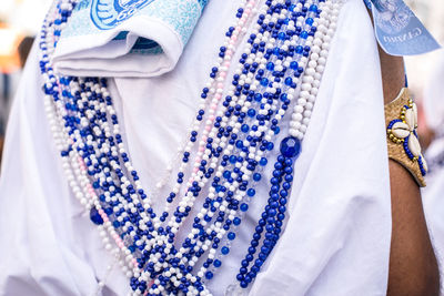 Details and props of the clothes of the traditional carnival group filhos de gandy that 