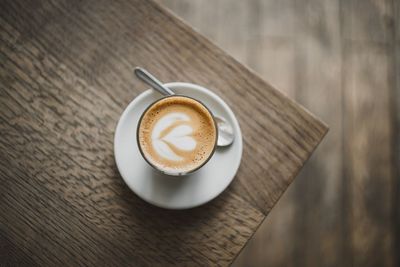 High angle view of cappuccino on table